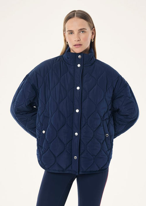 Surge Quilt Jacket In Dark Navy