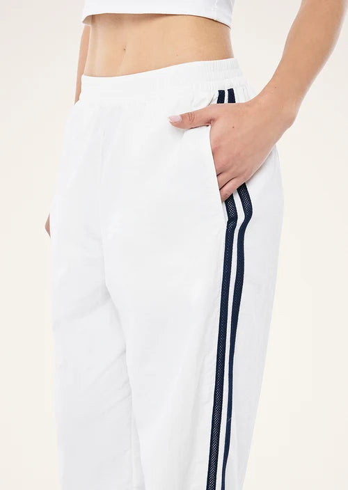 Relay Spray Track Pant In White & Dark Navy