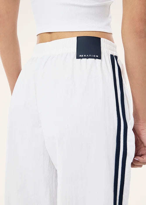 Relay Spray Track Pant In White & Dark Navy