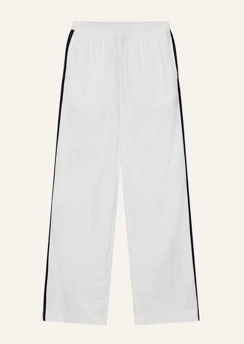 Relay Spray Track Pant In White & Dark Navy