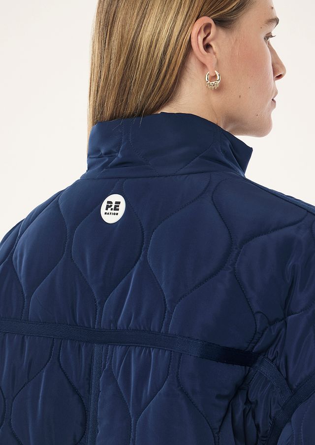 Surge Quilt Jacket In Dark Navy